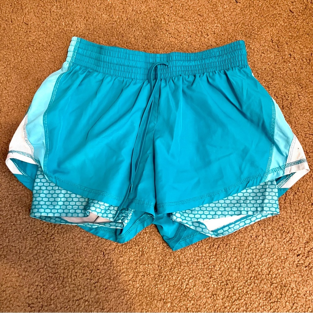Blue running shorts, built-in spandex